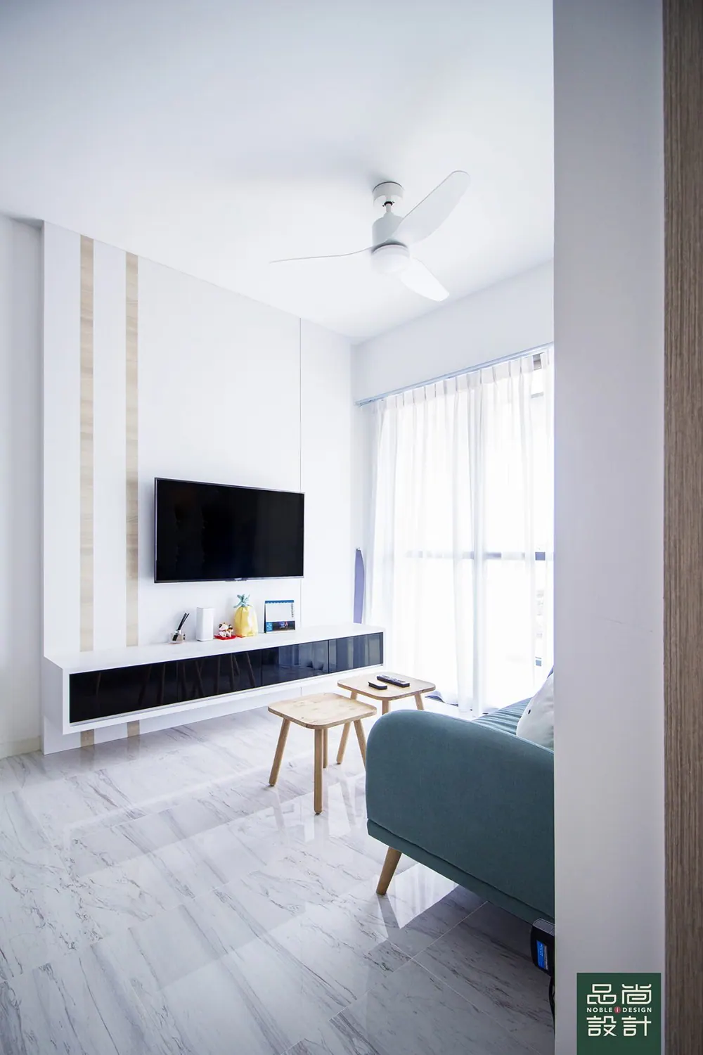 Living room in The Alps Residences 2 Bedroom — interior by Noble Interior Design