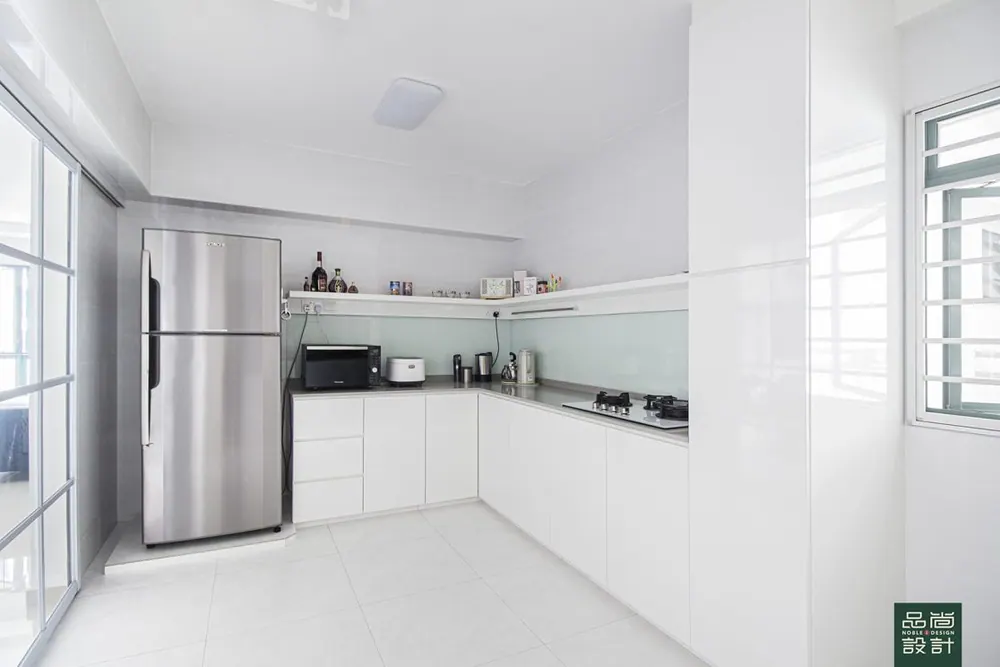 Kitchen in Admiralty Dr 4-room — interior by Noble Interior Design