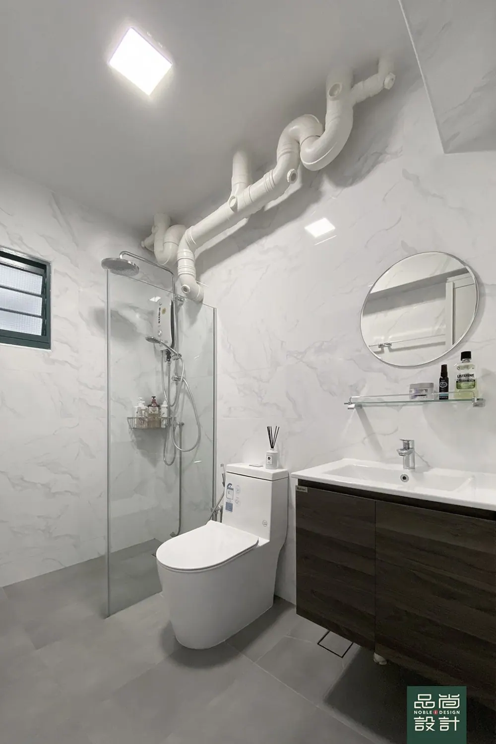Bathroom in Admiralty Dr 4-room — interior by Noble Interior Design